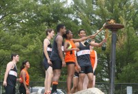 Loucks Lead Photo-Page 1 | The Examiner News The 48th Annual Glenn D. Loucks Track & Field Games were kicked-off at White Plains High School, on Saturday, by the Lighting of the Olympic Torch, as male and female members of the White Plains High School Tigers Track Team ran the track with the torch. Lauren Woods and Edward Leo Fisher lit the Torch to commence the games. Albert Coqueran Photos