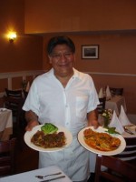 Walter Ricci of La Piccola Casa shows off his soft shell crabs and seafood pasta.