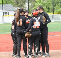 The Tigers Softball Team huddled to try and find solutions to The Ursuline School batters but was defeated 6-0, in the First Round of the Section 1 AA Playoffs, on Thursday, May 21, in New Rochelle. Albert Coqueran Photos