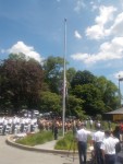 Boy Scouts from Hawthorne Troop 1 raise the American flag in honor of Flag Day during a special ceremony in Mount Pleasant on Sunday to commemorate Flag Day and the U.S. Army's 240th anniversary.