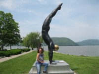 Cortlandt resident Pam Kolber-Zicca, owner of Just Add Water and Swim, posing at Riverfront Green Park in Peekskill. Photo credit: Neal Rentz 