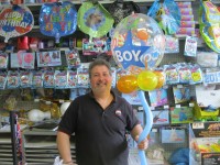 Photo caption: Putnam Valley resident Alan Ortner opened Balloons & Party on Westbrook in Cortlandt earlier this year.  Photo credit: Neal Rentz 