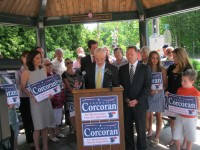 Bedford Councilman Francis Corcoran, surrounded by his supporters, including Westchester County Executive Rob Astorino, announced his candidacy Thursday in Katonah for the county Board of Legislators District 2 seat on June 25.