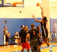 NY Liberty center Tina Charles is trying to regain her shooting touch in practice, as she lifts a floater above defenders for two points, at the Madison Square Garden Training Facility, in Tarrytown, on Wednesday, June 17. Albert Coqueran Photos 