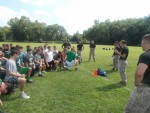 United States Marines talk to the Pleasantville High School football team following an exhausting practice the servicemen led last week.