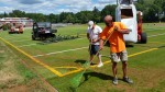 Employees of Global Turf worked to install new environmentally-friendly turf Thursday on the Pleasantville School District athletic fields.
