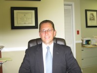 : Certified Public Accountant Robert Joyce works out of an office in Yorktown. Photo credit: Neal Rentz 