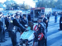 The piece of steel was brought inside the firehouse after an American flag covered it on its way to Brewster. 