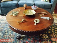 The Home Guru’s coffee table with its odd assortment of collectibles.