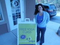 Christine Dodge stands outside Putnam Yoga, where yogis at any level can come in. She will be celebrating four years the end of this month. DAVID PROPPER PHOTO 