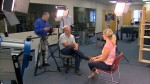 429 Business of the Week pic 3 | The Examiner News Video SEO Pro President David Vogel, standing, and Vice President Neco Turkienicz, seated, create specialized videos to help companies market themselves more effectively.