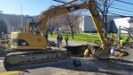 431 Sink Hole pic 1 | The Examiner News Crews work on Monday afternoon to repair giant sinkhole that appeared on Marble Avenue following a water main break Sunday night.
