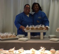 Photo caption: New Rochelle resident Gay Wheeler-Smith, left, and Peekskill resident Kecia Palmer-Cousins, owners of G&K Sweet Foods LLC in Peekskill, are shown above with their sweet potato pies that were served at the 2014 Super Bowl VIP Tailgate Party at Met Life Stadium. Photo credit: G&K Sweet Foods LLC 