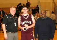 Harrison High School guard Zack Evans (center) was presented the Varsity MVP of the Game Award by WPHS Athletic Director Matt Cameron (left) and longtime educator, former player and coach, Harry Jefferson (right), the namesake of The 22nd Annual Harry Jefferson Showcase. Albert Coqueran Photos