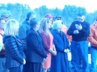 A group of Kent Highway Department workers take the first trip across the new and improved causeway in Kent.