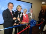 Left to right, Northern Westchester Hospital President and CEO Dr. Joel Selgiman, Board of Trustees Chair Nancy Karch, former Mount Kisco Mayor Patricia Reilly and longtime village resident Joan Stewart, cut the ribbon in front of NWH’s interactive timeline to celebrate its 100th anniversary year.