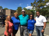 Bill Carter (center) with Marlyn Pena and Sonja Washington (left), Tanya Johnson and Greenburgh Police Sergeant Hall (right) at the Lois Bronz Children’s Center potluck fundraiser held on the grounds of the Theodore Young Community Center this past summer.