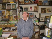 Jan. 26 NWE BOW Bruised Apple Pix | The Examiner News Peekskill resident Scott Sailor, owner of Bruised Apple Books and Music, which opened in the city in 1993. Photo credit: Neal Rentz