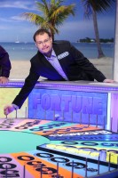 Robert Santoli spinning the wheel on Wheel of Fortune. 