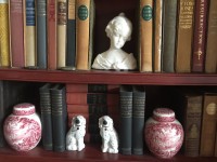 Detail of The Home Guru’s shelving, which combine collectibles with books. 