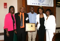 Nobody is prouder of the accomplishments of Head Coach Spencer Mayfield (second left), than his family [l-r] wife, Theaudry, son, Spencer IV, daughter, Amber and cousin, Miriam Thomas, who celebrated with him at his NYS Basketball Hall of Fame Induction, on Sunday, at the Glens Falls Civic Center, in Glens Falls, NY. 