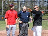 Stepinac Head Coach Keith Richardson (left), umpire Dan Campbell (center) and White Plains Head Coach Marcel Galligani go over the ground rules before the start of the 13th Annual Joe McAvoy City Challenge. 