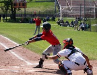 Crusdaers leadoff hitter Edwin Feliciano (pictured) reaches for a pitch and slaps a line-drive to leftfield, which Tigers leftfielder Daniel Lotito made a diving catch on for the first out of the Joe McAvoy City Challenge that White Plains won 6-1. 