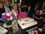 Marian Henry, surrounded by family, gets ready to cut her cake at a party Thursday afternoon at The Bristal assisted living facility in Armonk in celebration of her 107th birthday.