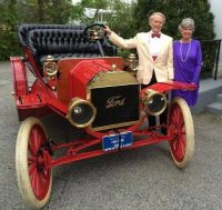 White Plains residents Paul and Barbara Schwarz, dressed in the fashion of 1916, posed by the 1909 Ford Model T from the Malcolm Pray Collection parked in front of the C.V. Rich Mansion during the White Plains Centennial Ball, held May 5. Source: Facebook.