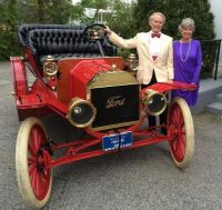 Gala Lead | The Examiner News White Plains residents Paul and Barbara Schwarz, dressed in the fashion of 1916, posed by the 1909 Ford Model T from the Malcolm Pray Collection parked in front of the C.V. Rich Mansion during the White Plains Centennial Ball, held May 5. Source: Facebook.