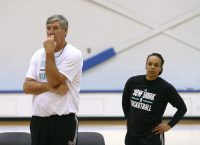 NY Liberty Head Coach Bill Laimbeer (left) and Director of Player Development Teresa Weatherspoon (right) intensely review the play on the court as the Liberty practice at the MSG Training Center, in Tarrytown, on April 28. Laimbeer in his fourth season at the helm is hoping to bring that elusive WNBA Championship to New York. 