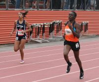 White Plains High School freshman Farrah Miller (right) gives it her all in the Girl’s 400 Meter Dash. Miller finished the race with a time of 100.26, which was her best time ever in the 400 Meters Dash.