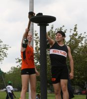 Cardon Furry (left) and Adrian Ojeda-Britz (right) seniors on the White Plains High School Girl’s and Boy’s Track Teams lit the Olympic Torch, during the Glenn D. Loucks Games Opening Ceremony, on Saturday, May 14. Albert Coqueran Photo 