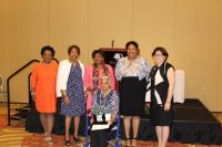 Bronz | The Examiner News Lois Bronz (seated) was honored for a lifetime of community service. NYS Senator Andrea Stewart-Cousins stands behind Bronz and is flanked by members of the Lois Bronz Children’s Center Board.
