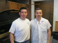 Oscar Aguilar opened Oscar’s Restaurant & Bar in Yorktown about four months ago. Also shown above is Mauricio Ruic of White Plains, one of his employees. Photo credit: Neal Rentz 