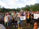 Community members held signs and lit candles at Peekskill’s vigil Thursday night to remember the 49 victims of last weekend’s mass shooting in Orlando, Fla.