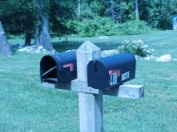 The Evans household has two mailboxes. One for Brewster and another for New Fairfield.