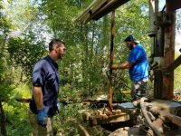 Roger Mills (left) and Adam Yarrish from Boyd Well Drillers shown repairing well at Chateau Ridge in Mahopac.