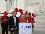 Congressional candidate Paul Oliva and state Senate candidate Julie Killian criticize a proposed change from the U.S. Department of Education that would automatically designate schools in need of improvement if at least 5 percent of their students opt out of the standardized exams.