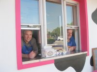 : The Daily Moos soft ice cream stand opened on Route 202 in Yorktown on Independence Day. Shown above are its co-owners Mahopac resident Frank Realbuta, right, and Dutchess County resident Robert Covone. Photo credit: Neal Rentz 