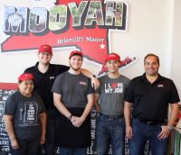 Anthony Grippo, far right, owner of Mooyah Burgers, Fries & Shakes’ Briarcliff Manor franchise, with his staff. 
