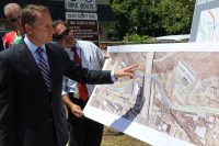  Westchester County Executive Rob Astorino points to a map showing where the proposed final link to connect the North and South Trailways will be built.