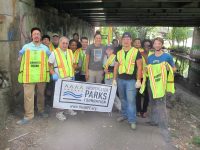 Members of the Westchester Parks Foundation Graffiti Squad tackled vandalism at White Plains’ Bronx River Reservation walkway bridge at Hamilton Avenue.