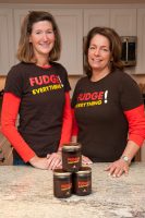 Fudge Everything! co-founders Anne and Debbie offer jars of dark chocolate fudge at their booth. 