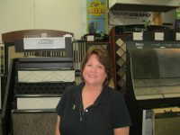 sept-20-nwe-bow-absolute-flooring-owner-pix | The Examiner News Stormville resident Mary Fellbusch and her husband, Peter, have owned Absolute Flooring of Yorktown for 30 years. Photo credit: Neal Rentz