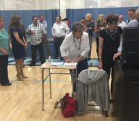 Mount Pleasant School District residents and officials wait for votes to be tallied Tuesday night for the proposed .6 million capital projects bond. The referendum was overwhelmingly approved by voters.