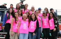 Gabby Heffernan (front right) and her Alpha Gamma Delta Sorority from Seton Hall University wore pink T-shirts inscribed, “I am Nancy Strong” to support her mother Nancy’s fight against breast cancer. Nancy (center) joined Gabby and her Sorority to watch White Plains beat Ramapo 44-22 as Nancy’s son and Gabby’s brother, Dennis Heffernan played wide receiver for the Tigers. 