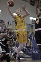 Ryan Peterson of Pace scores a basket in the win over Felician.