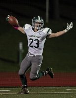 Charlie McPhee celebrates after scoring a touchdown.