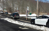 roaringbrookroadcrossing | The Examiner News The troubled Roaring Brook Road grade crossing pictured here two winters ago. New Castle officials plan to make a push to build a bridge over the tracks and Saw Mill River Parkway.